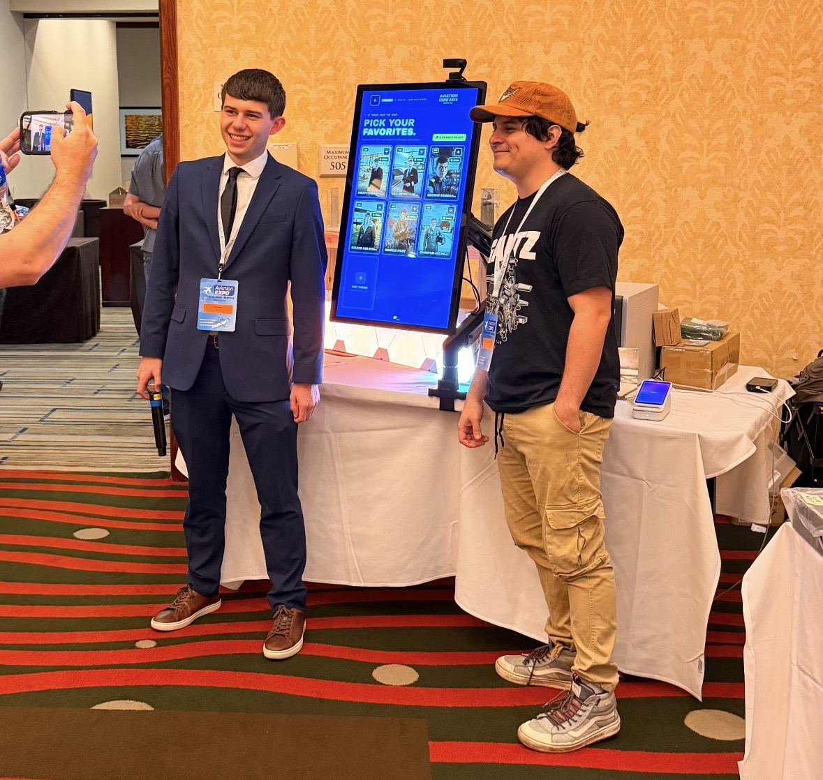 AI Photo Lab pop-up activation set up on an expo floor, with guests lined up to become AI-generated portraits.